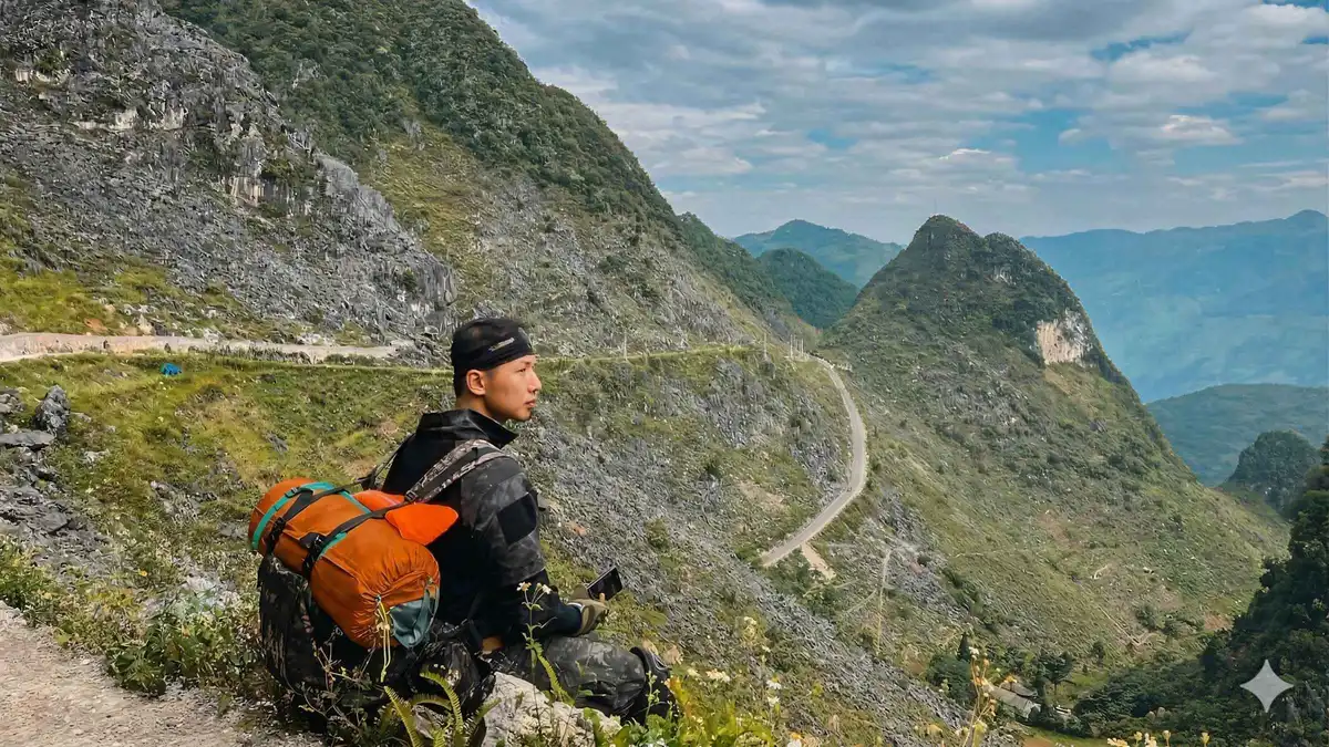 Small group of riders on a mountain switchback near Quan Ba on a 3-day Ha Giang loop motorcycle tour from Hanoi, northern Vietnam